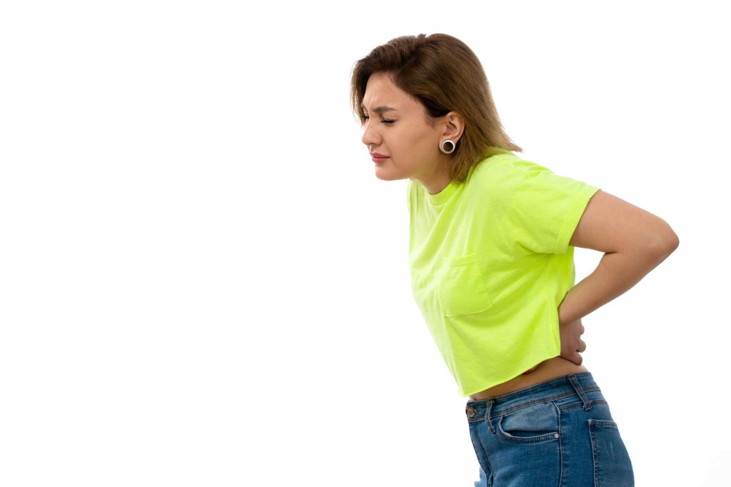 bel fıtığı ağrısı çeken kadın.